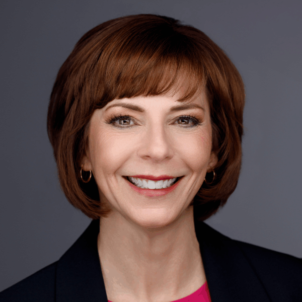 Image-23 shows a smiling woman with short brown hair in formal attire.